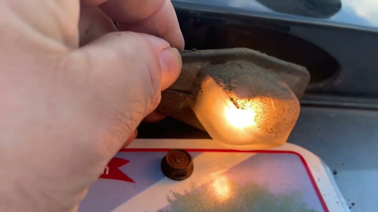 Changing a plate light bulb on a  Honda fit 