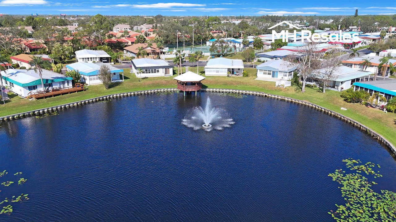 Beautiful Lakefront View Manufactured Home with the Best Lot in the Community