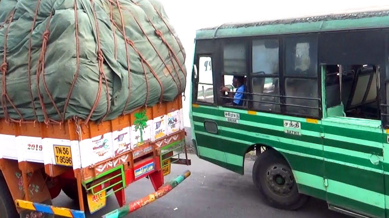 Tnstc bus hit the lorry in Dhimbam ghat road