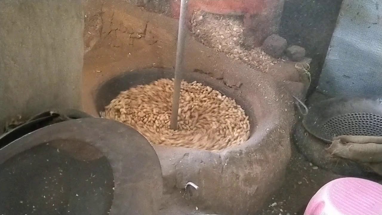 Sand roasting of groundnut 1