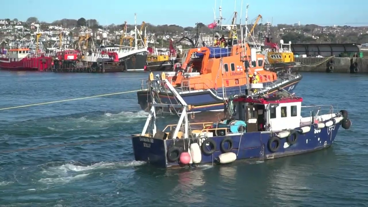 Penlee lifeboat rescues boat from slip.