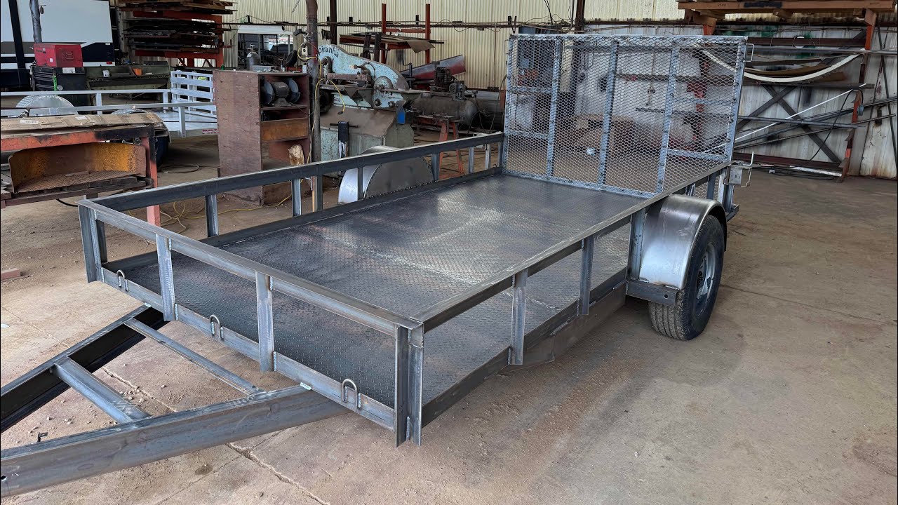 Traila 77x 12 piso de metal de diamond plate eje de torcion quedó perrona 