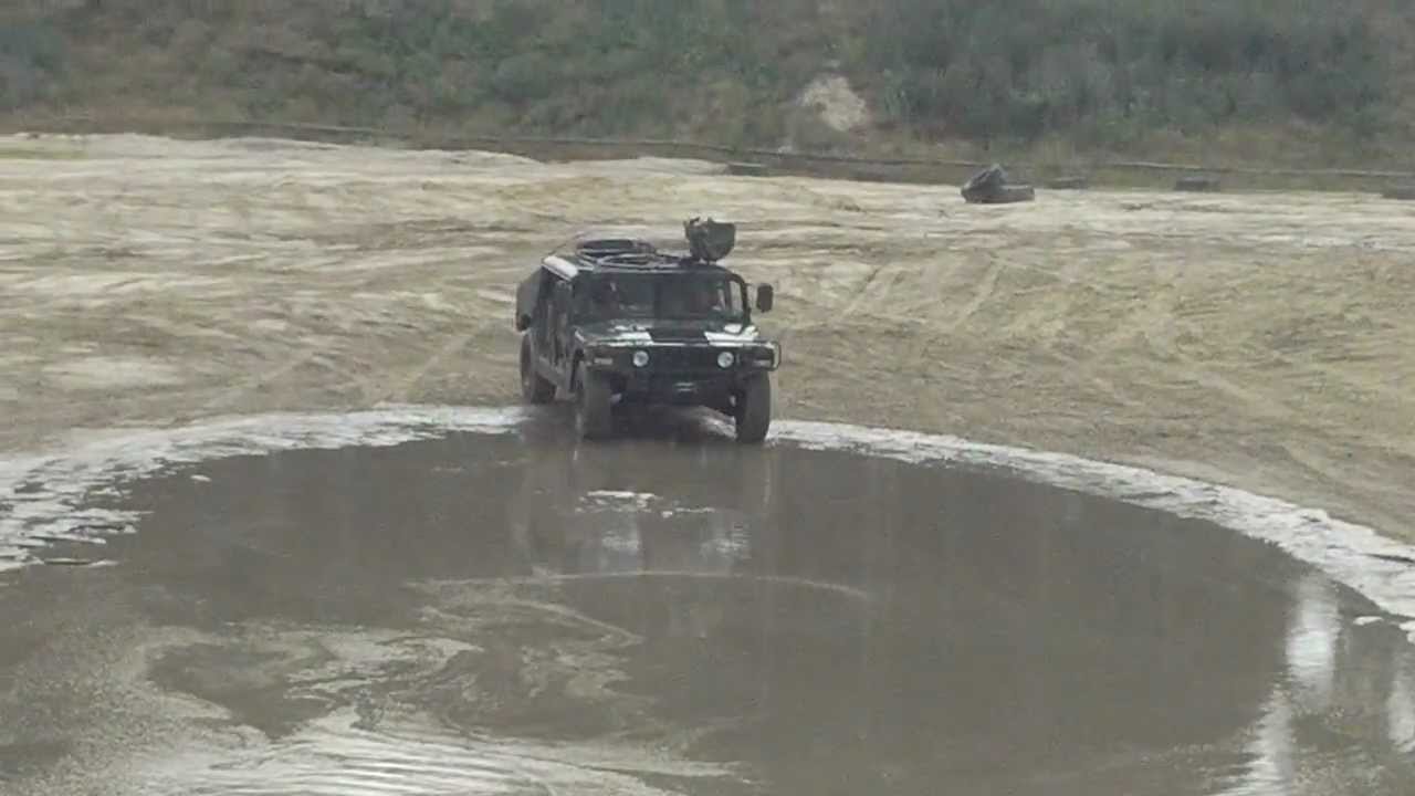 M1026 HMMWV D.H.O.G. offroading in Furstenau Germany Aug. 2012