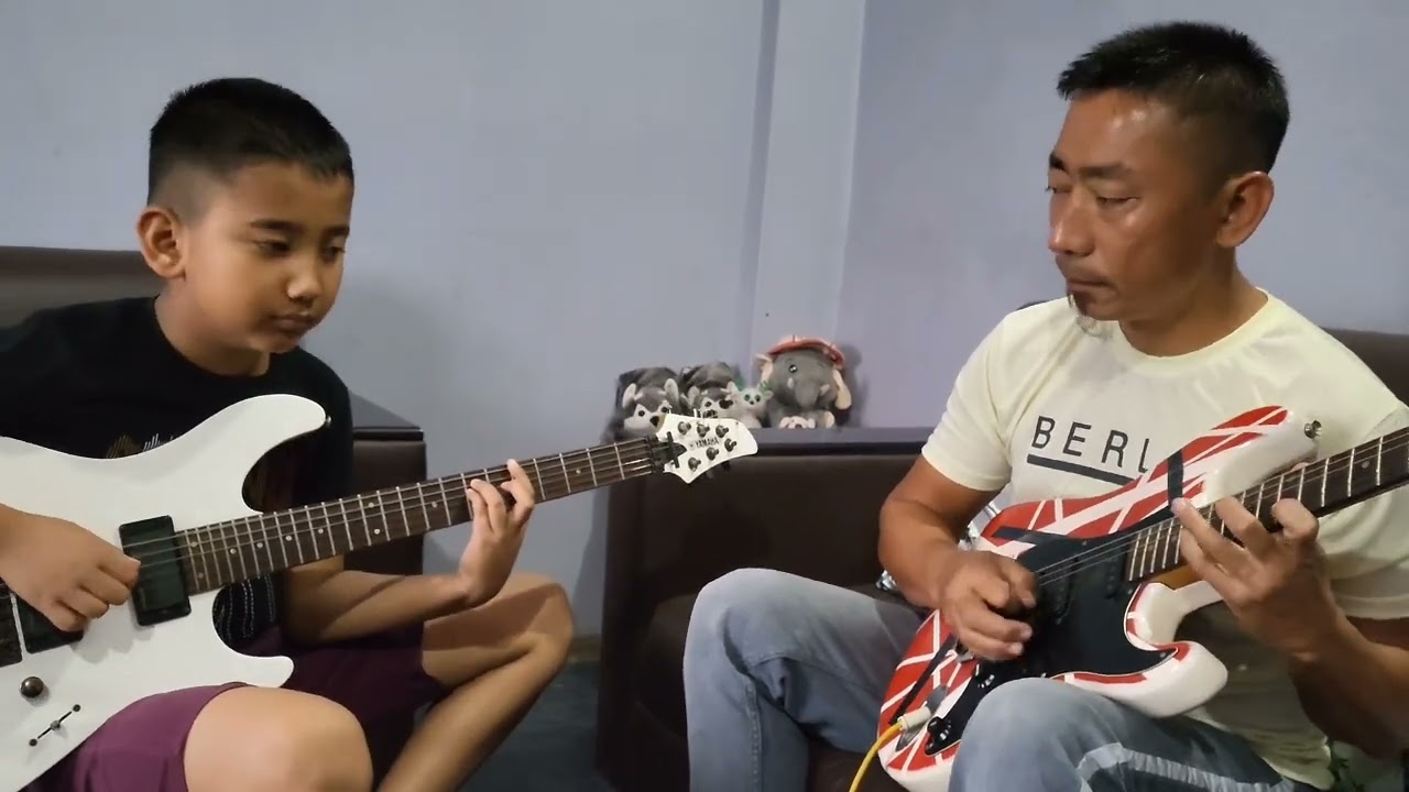 Father and son jamming guitar by Ipelong Naga #jamming#guitar#guitarworld #music