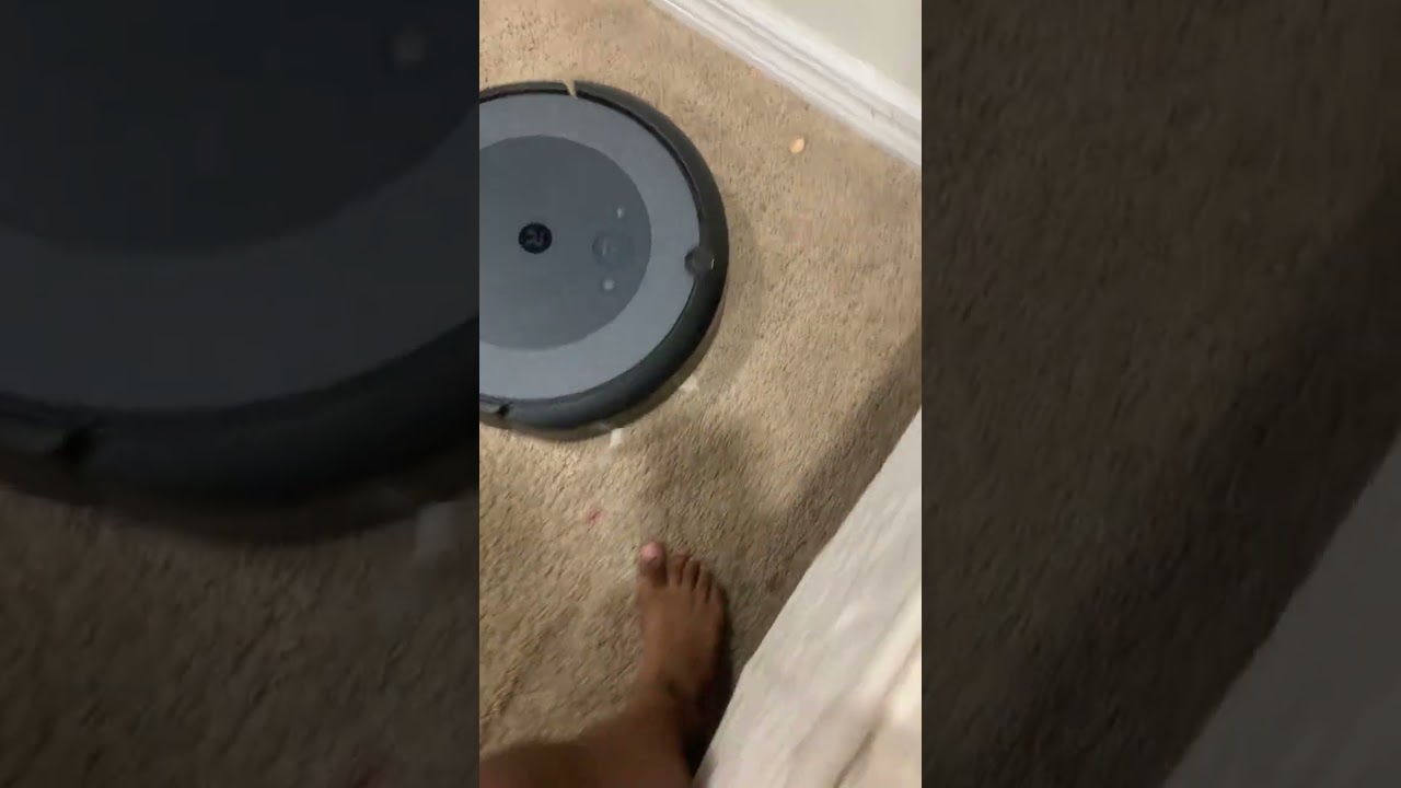 Roomba i3cleaning my family room