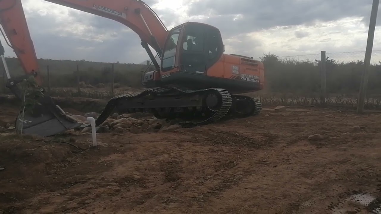 how to move an excavator with one track