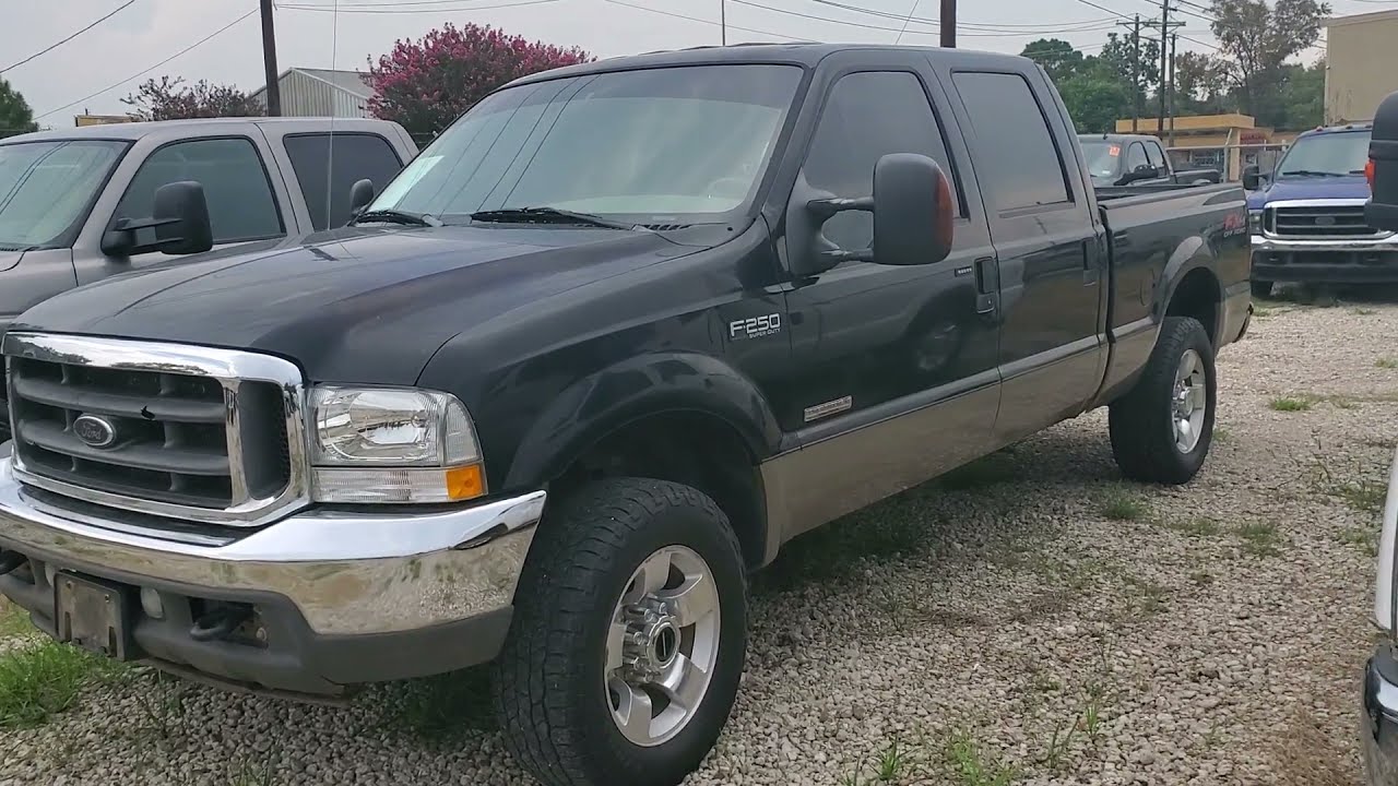 2004 F250 Black - AngletonTrucks.com