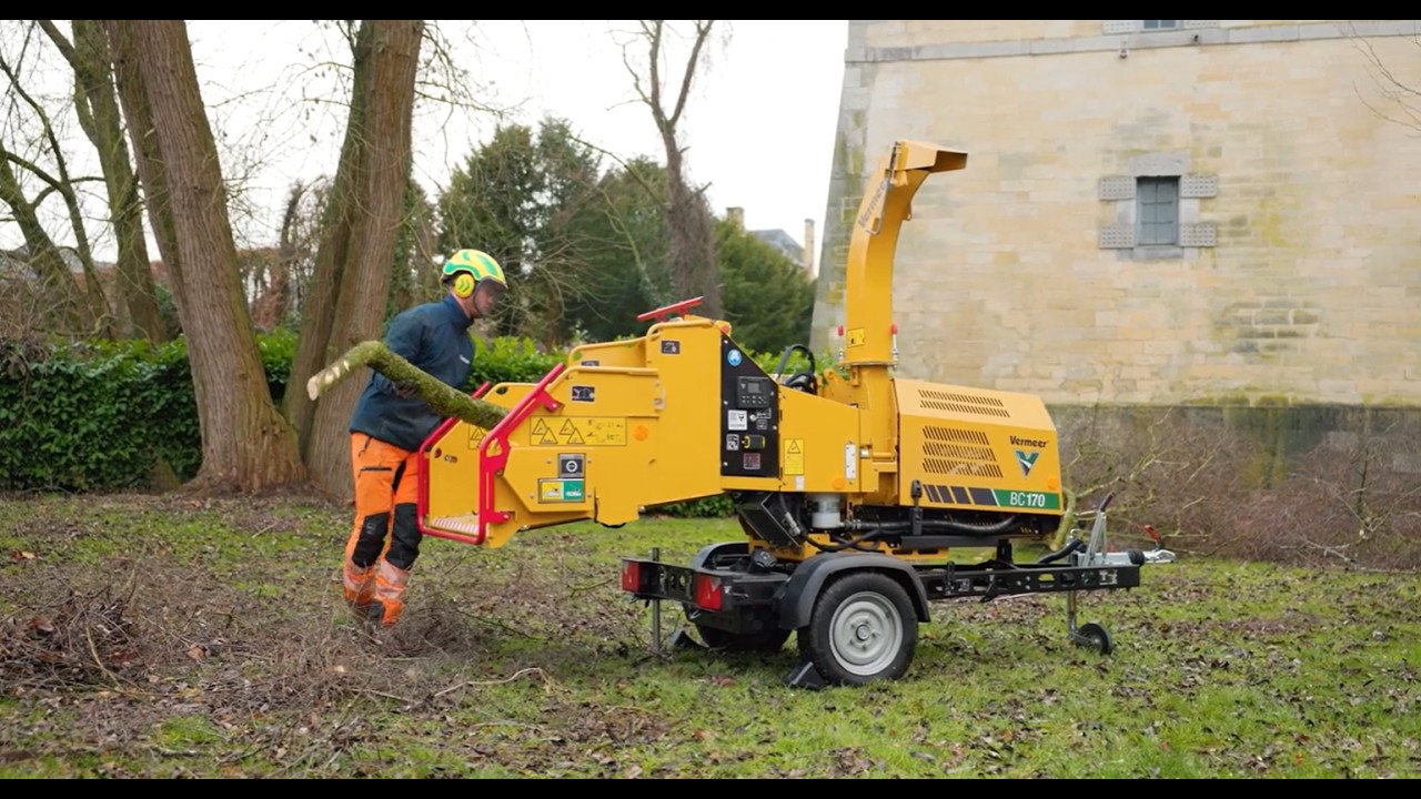 The Vermeer BC170 brush chipper in action