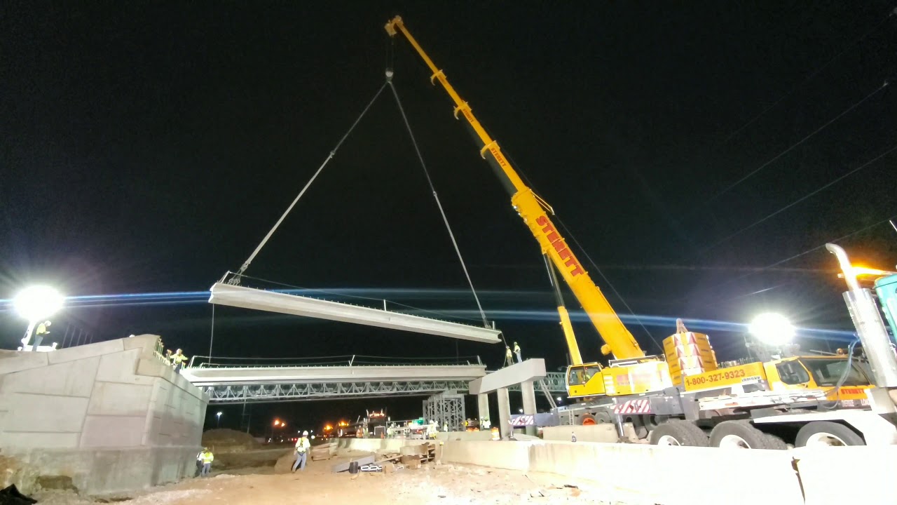 Sterett LTM 1400-7.1 setting a couple beams