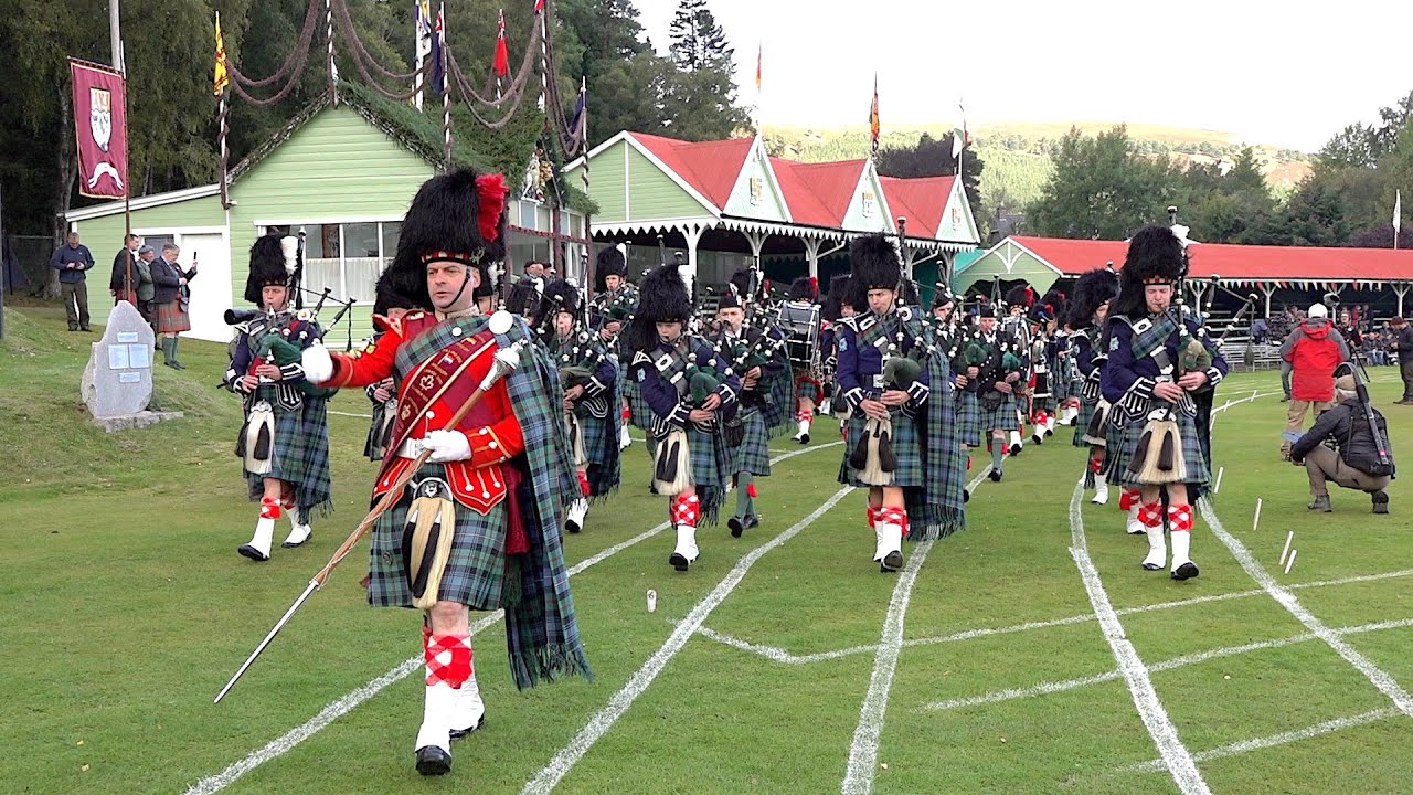 Opening march of the 2019 Braemar Gathering in Royal Deeside Scotland by Ballater Pipe Band
