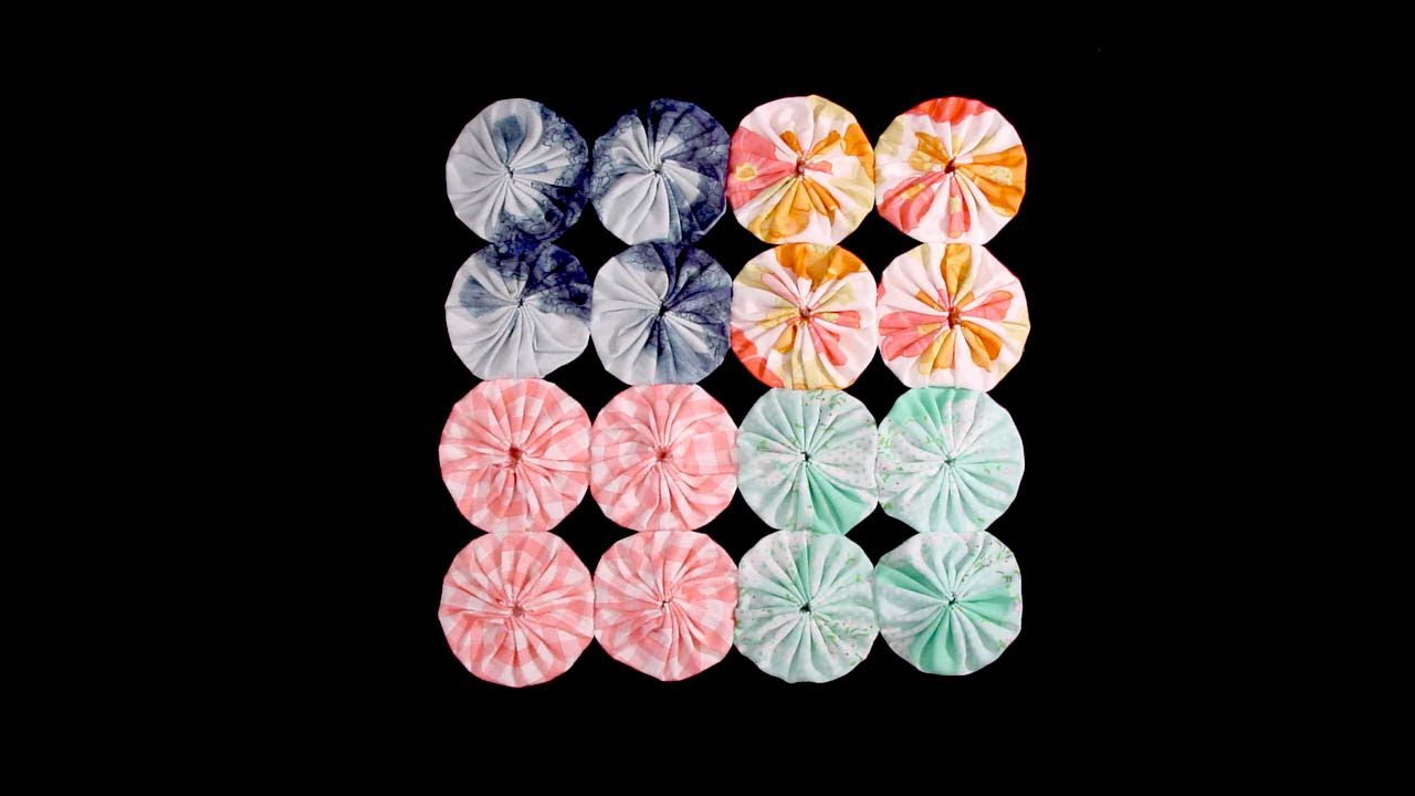 Sewing Fabric Yo-Yos and Suffolk Puffs Together