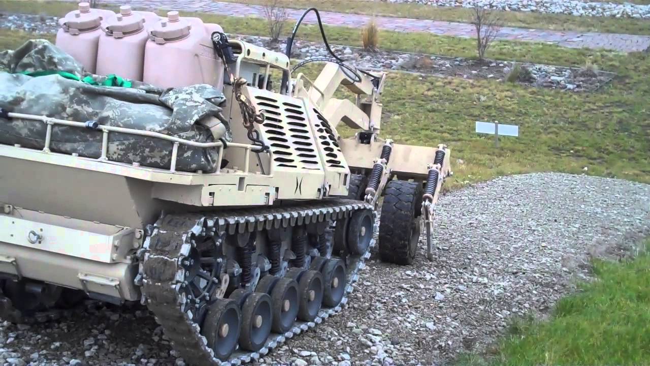 Protector Robot with a Mine Roller / Rake