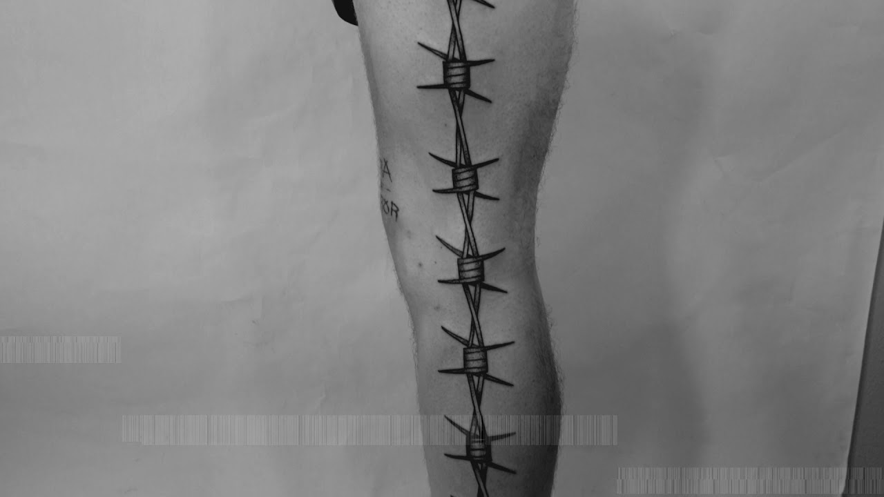 BARBED WiRE TRACK SUiT TATTOO