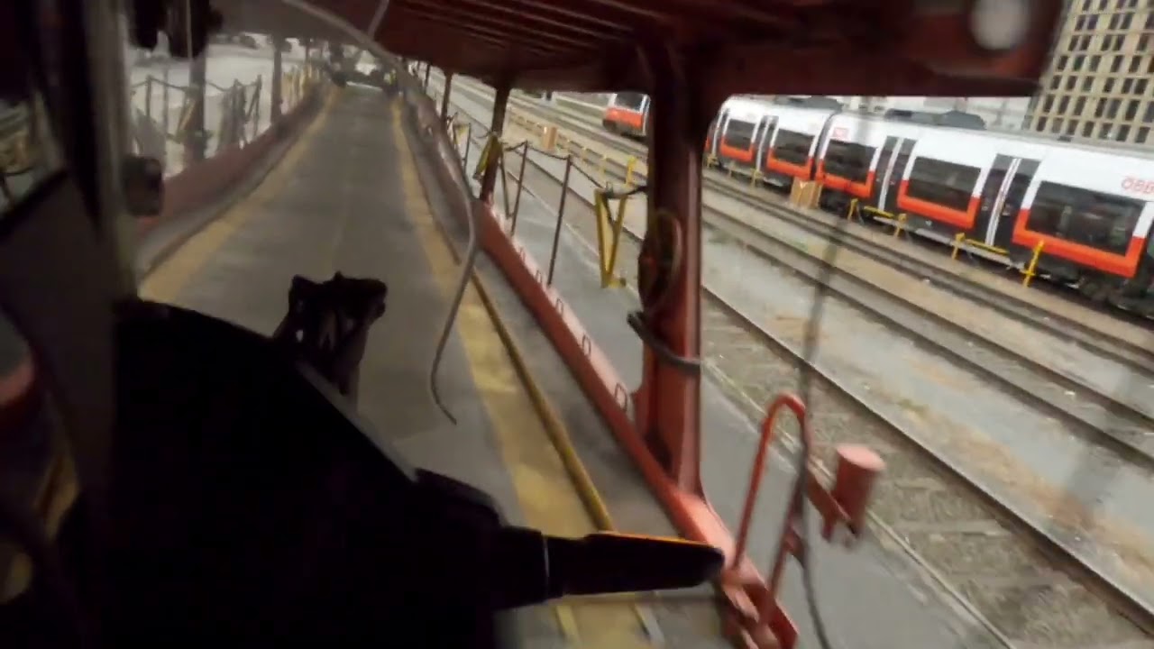 Loading motorcycles on train trailer in Innsbruck