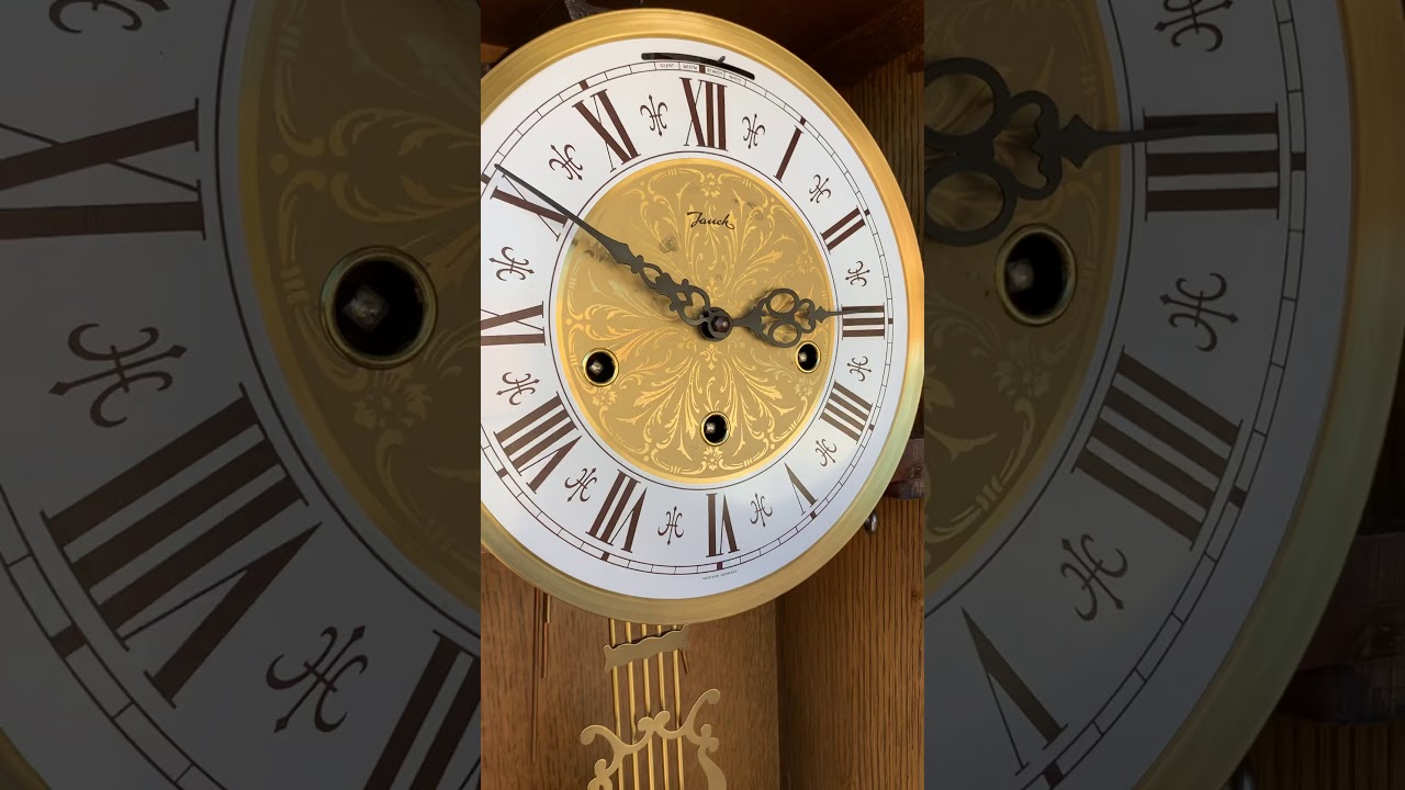 Jauch 31”X13” MINT condition triple chime wall clock.