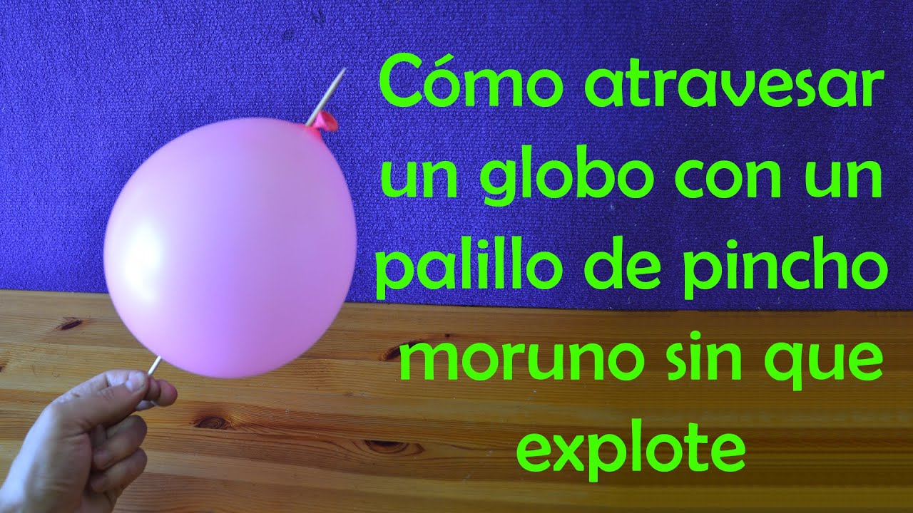 Atravesar globo con palo de pincho moruno
