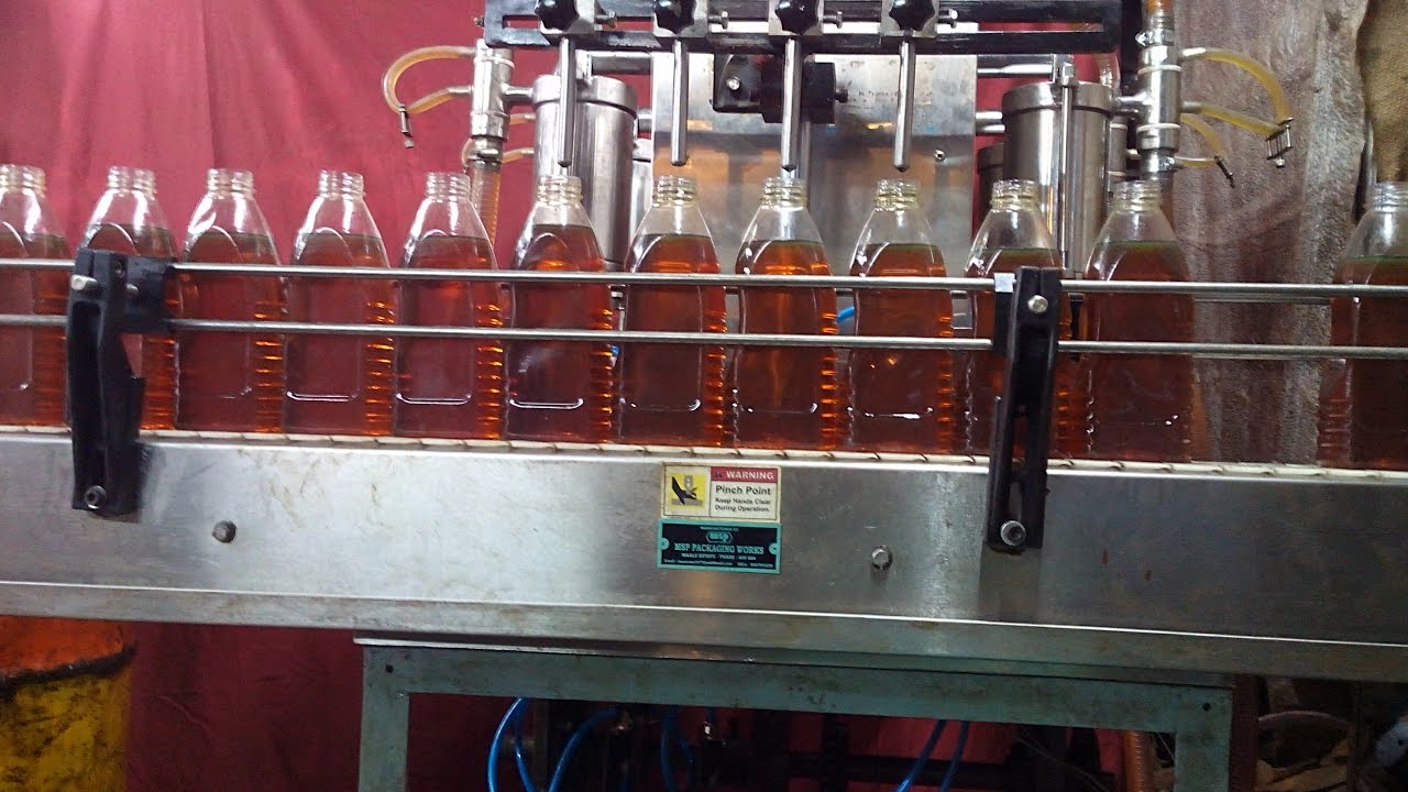 Four Head sanitizer,  syrup/ liquid/ oil/ juice/ water Fillling capping and Sealing Machine