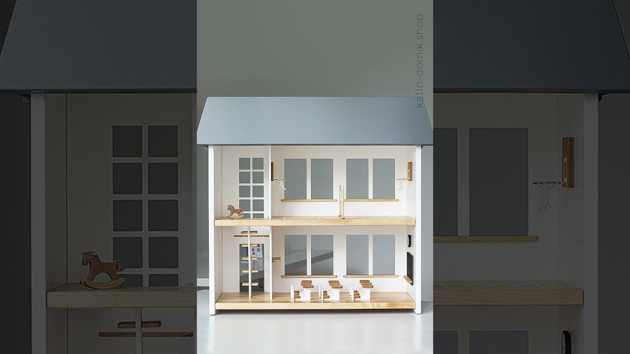 Wooden dollhouse designed like a charming school