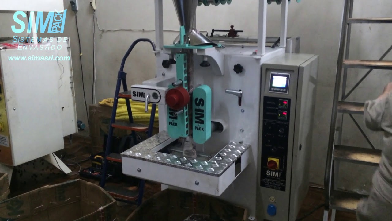 Envasadora SIMPACK ALM-250-V envasando grageas