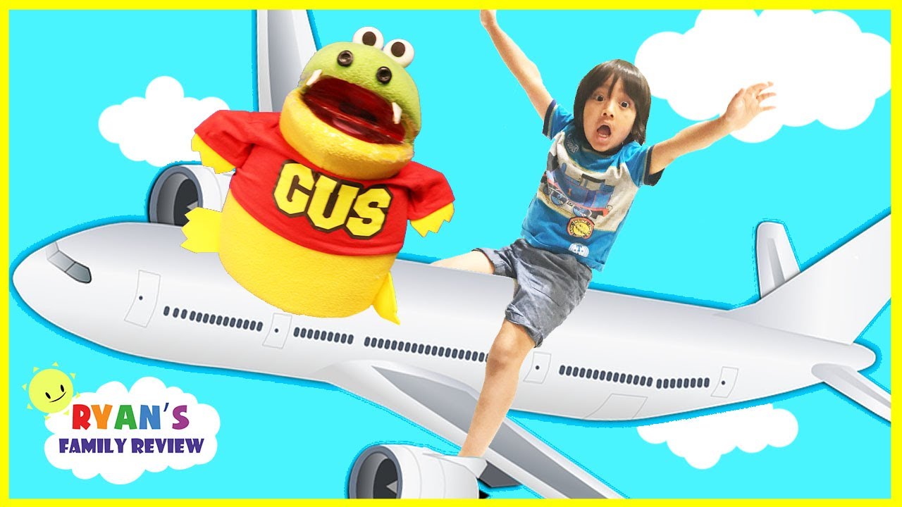 Family Fun Vacation with Ryan's Family Review! Ryan on the Airplane with GUS going to California