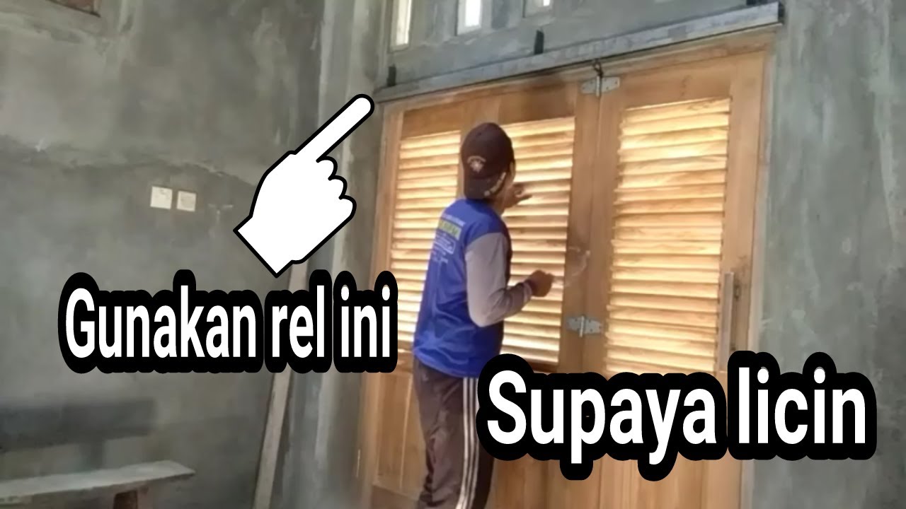 contoh pintu lipat garasi menggunakan rel besi