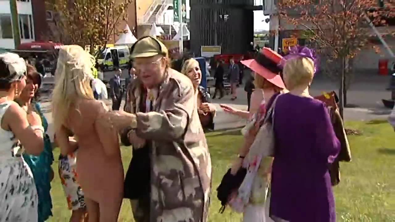 Ladies Day: John McCririck 'gets to grips' at Aintree races
