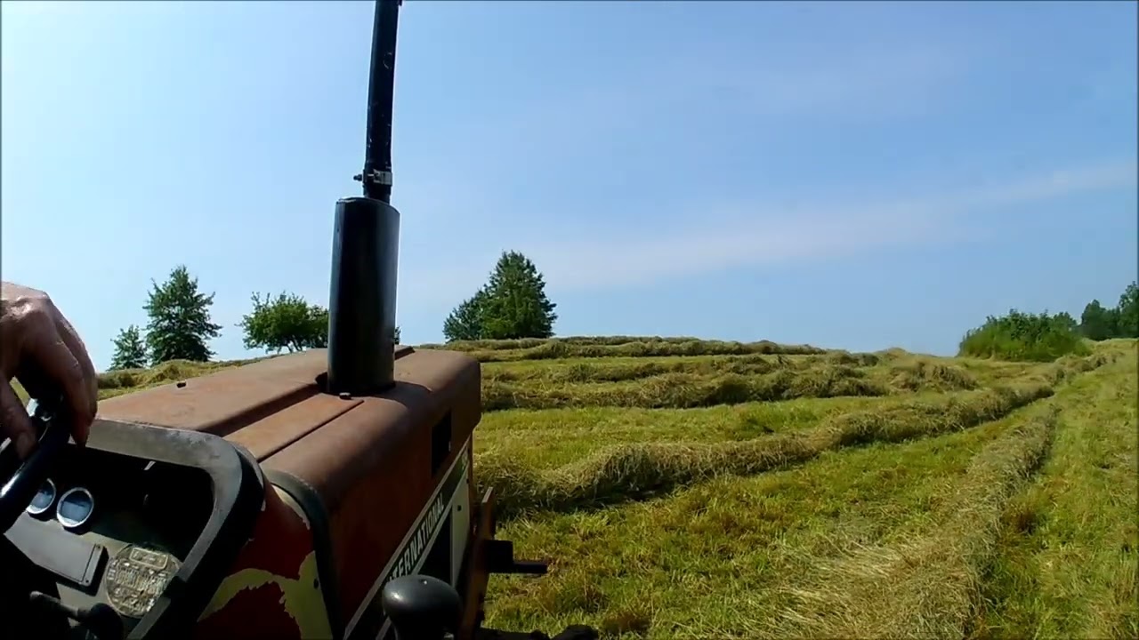 IH 584 and Case IH 96 rake ride along