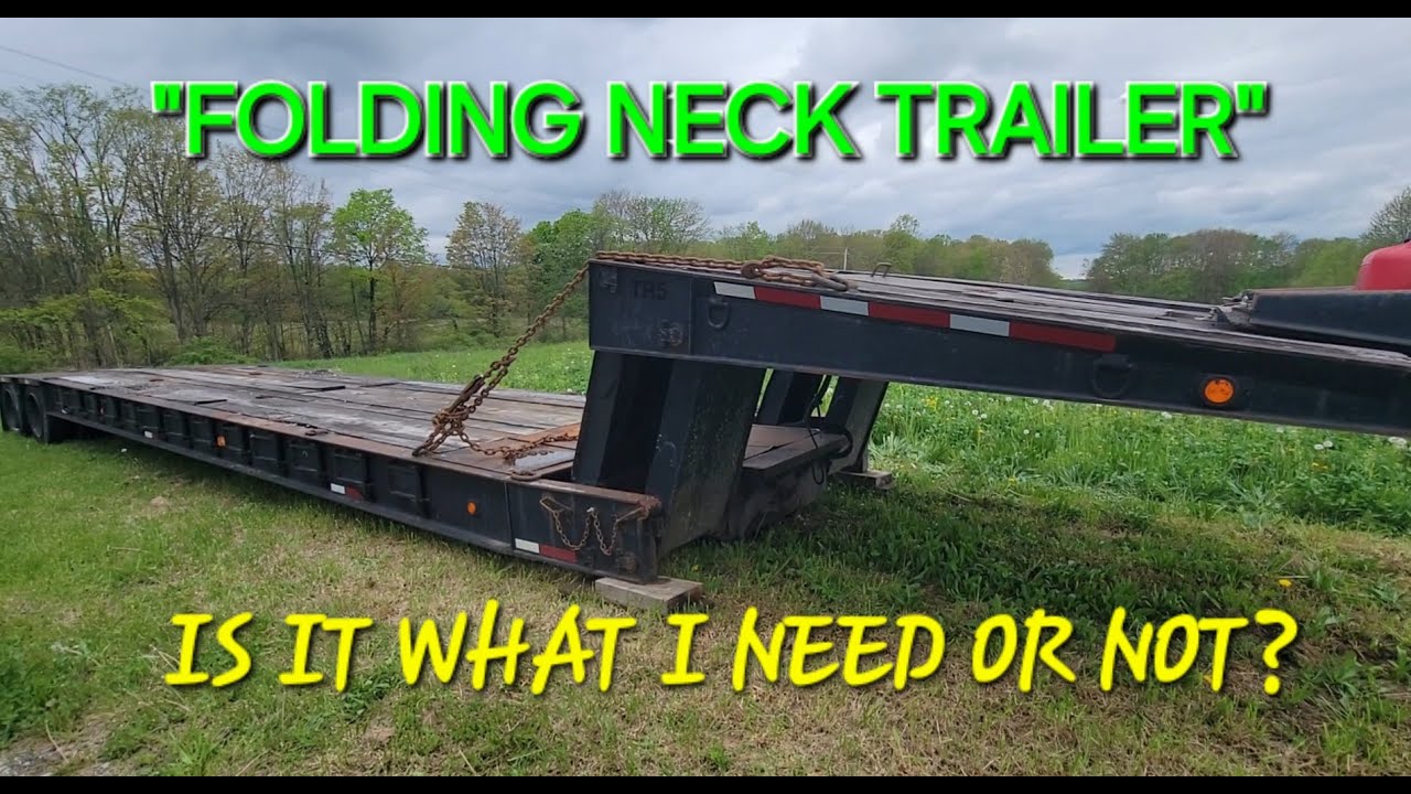 LOOKING AT DAN'S HYDRAULIC FOLDING NECK TRAILER EAGER BEAVER 81,120LBS GVWR!