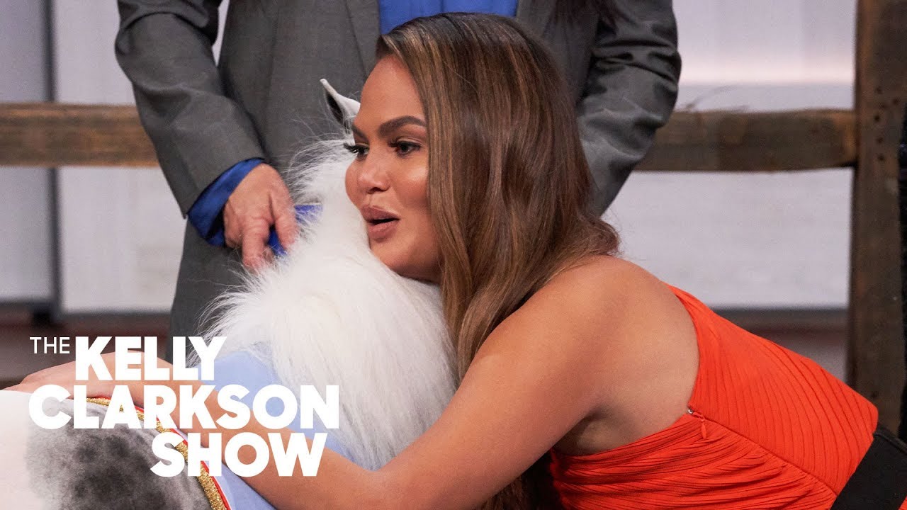 Watch Chrissy Teigen Cuddle A Mini Horse Who Can Play The Piano