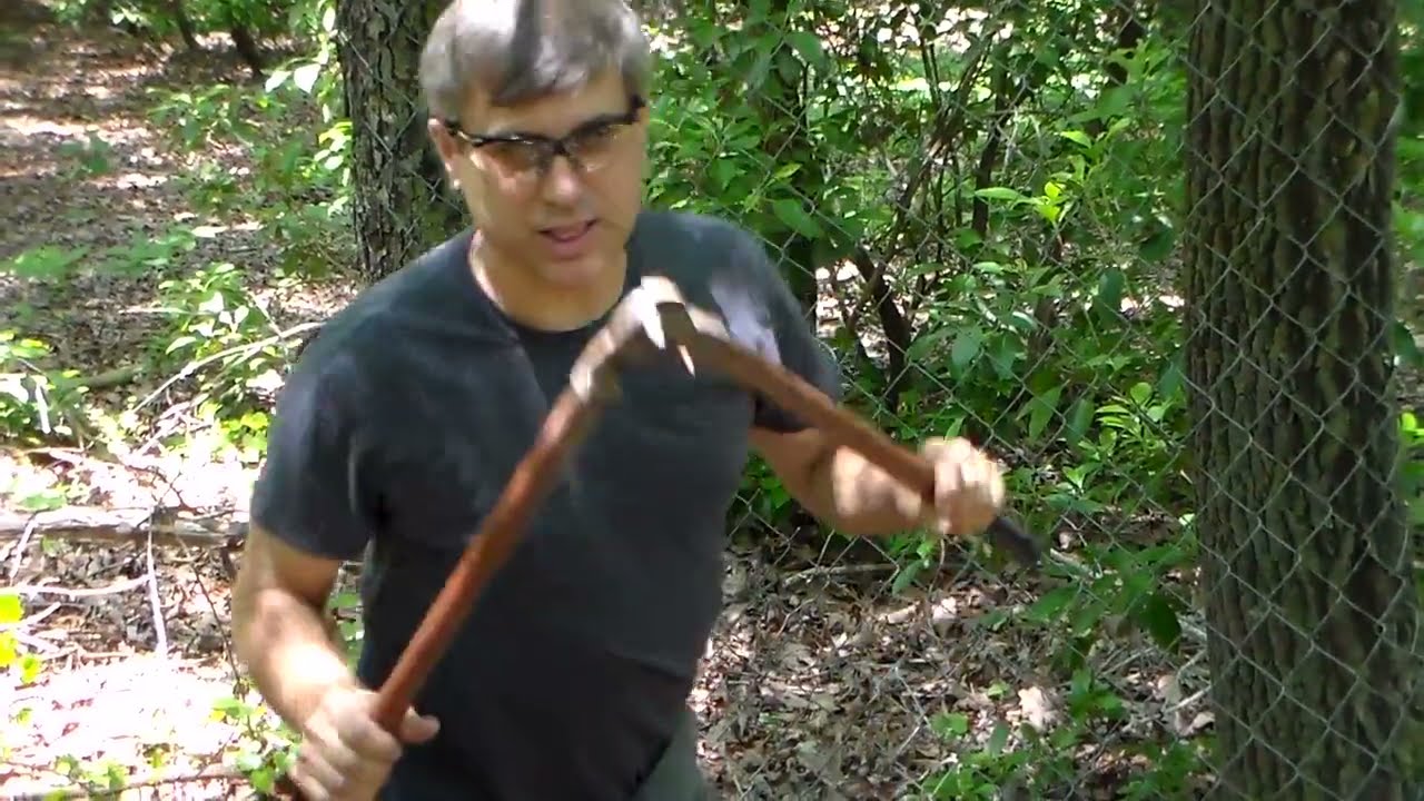 Testing different tools to cut fencing in a emergency.