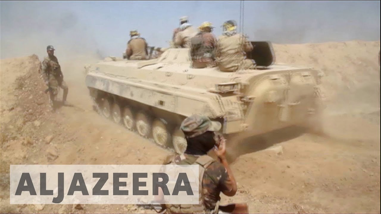Iraqi forces battle to retake Tal Afar from ISIL