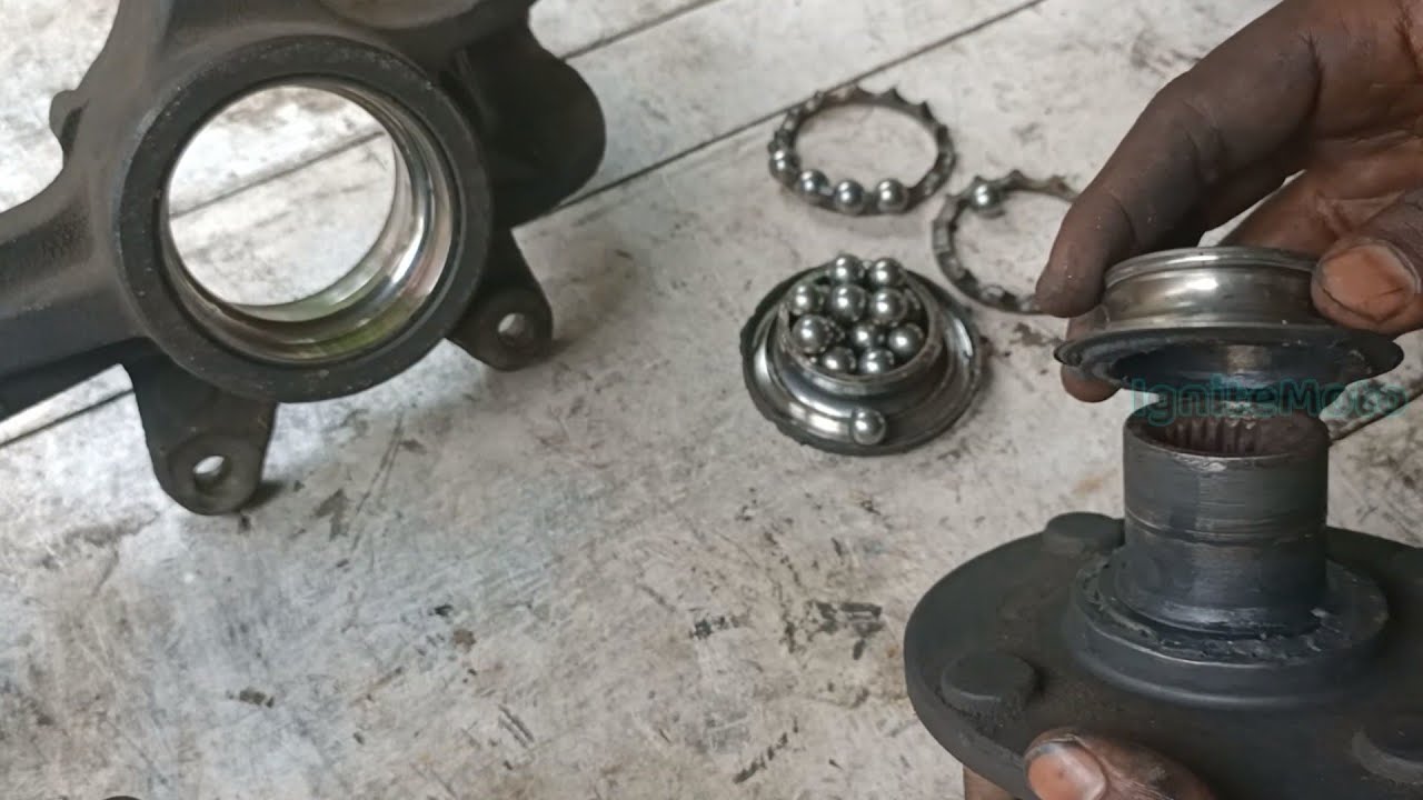 ford fiesta front wheel bearing noise fixing | drive shaft bearing replacement| tamil | ignite moto