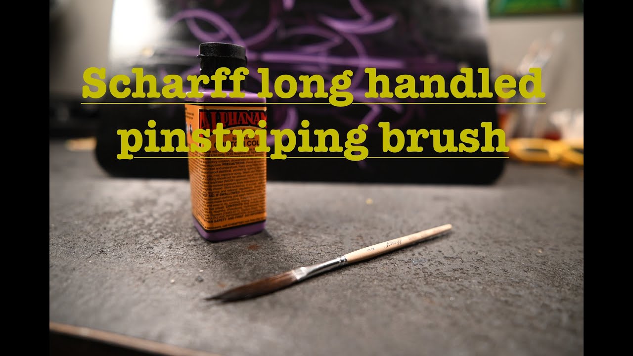 Scharff long handled pinstriping brush doing some amazing tricks in the paint.