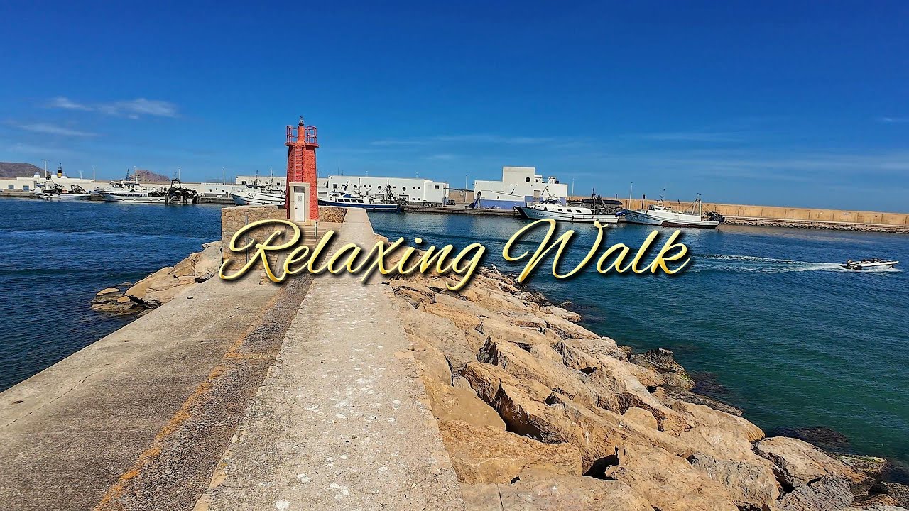 A relaxing walk to the yacht harbor in Altea | 4K video from Costa Blanca, Spain