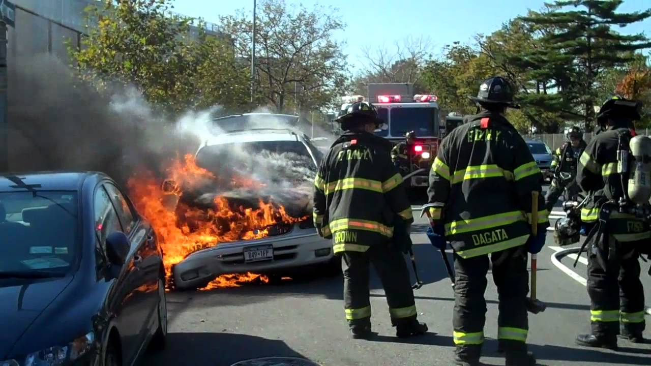FDNY PUTS OUT A CAR FIRE AT THE  BELT PKWY /OCEAN PKWY EXIT
