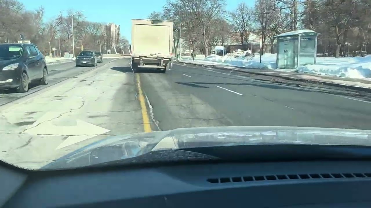 Driving a snowy highway ramp”-keep moving to avoid getting stuck “