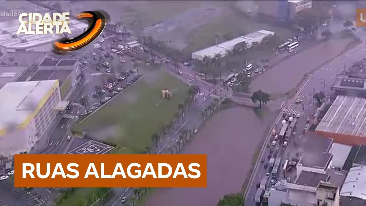 Chuva forte atinge as zonas norte e leste de São Paulo; rio Aricanduva está perto de transbordar