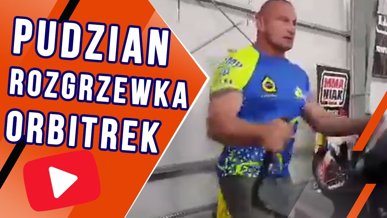 Pudzian rozgrzewa się na orbitreku - trening siłowo-wytrzymałościowy (11.05.18)