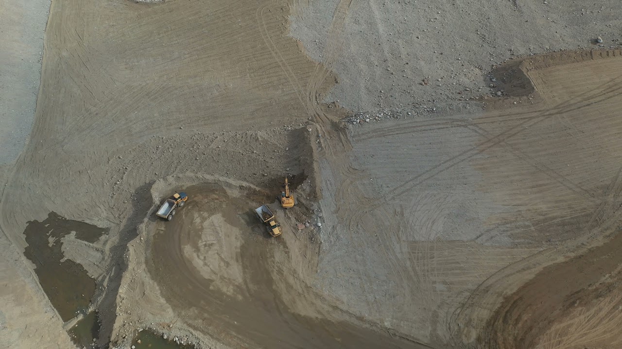 Caterpillar 336 Hydraulic Excavator dumping materials into dump truck #postmymachine #shorts