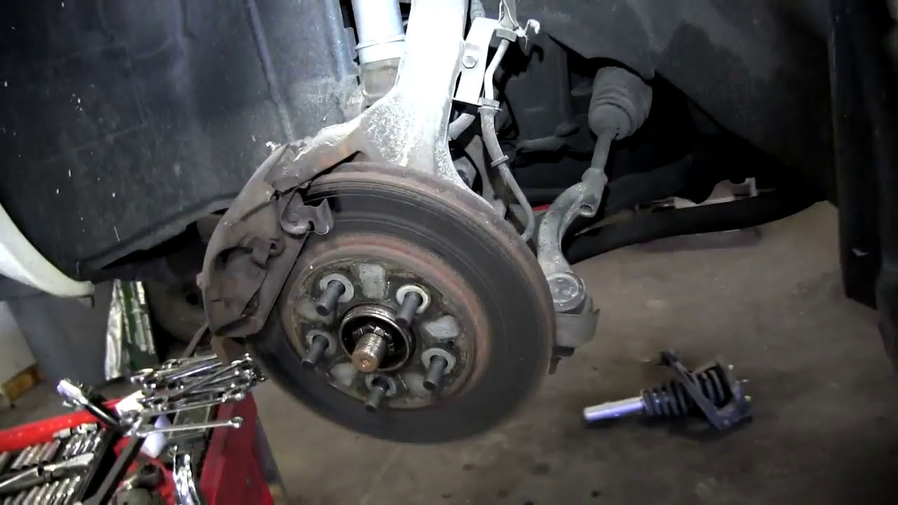 Замена передних стоек в сборе на Chrysler Cirrus l SENSEN Shocks & Struts 2000 года выпуска