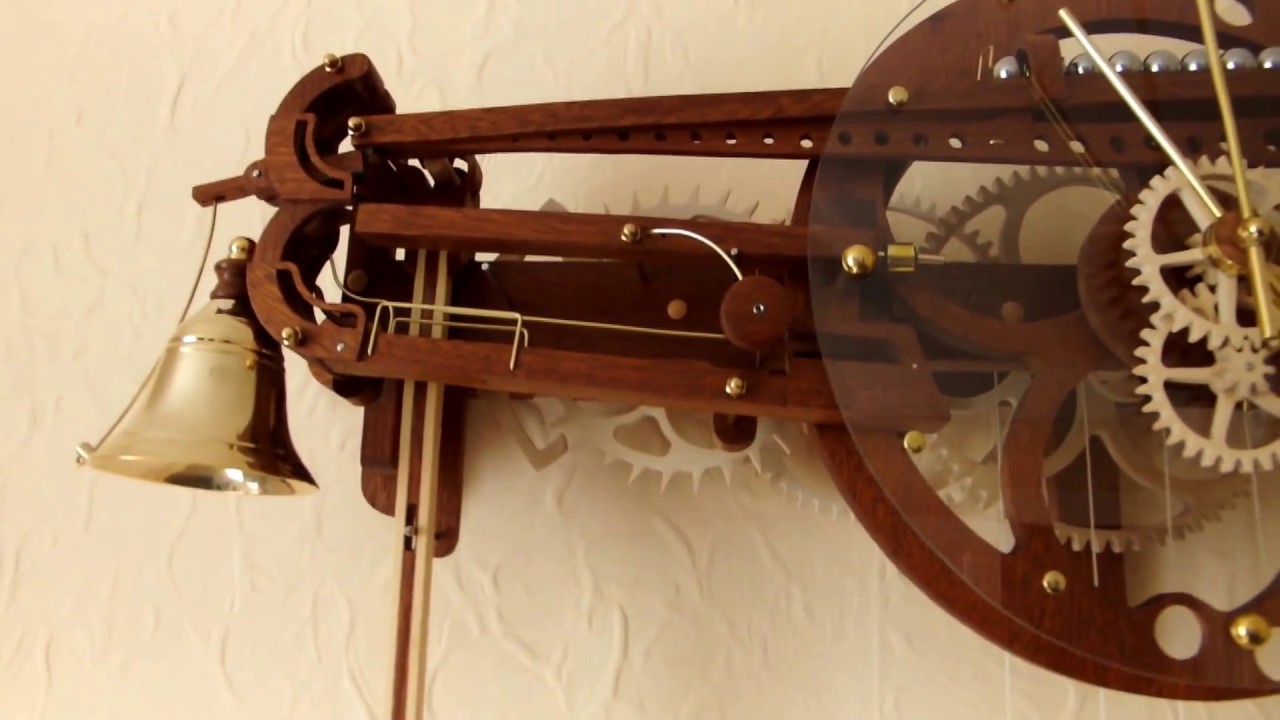 Marble strike clock using ball bearings