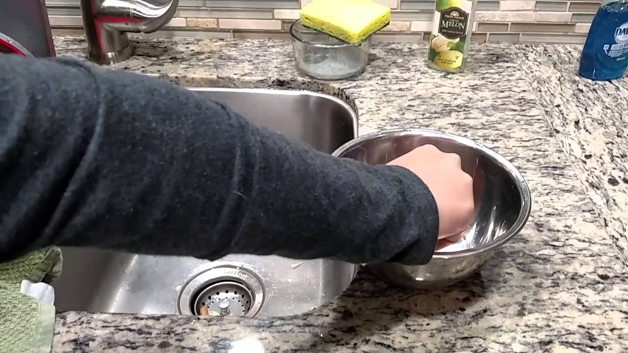 Trying to crush a egg one handed.