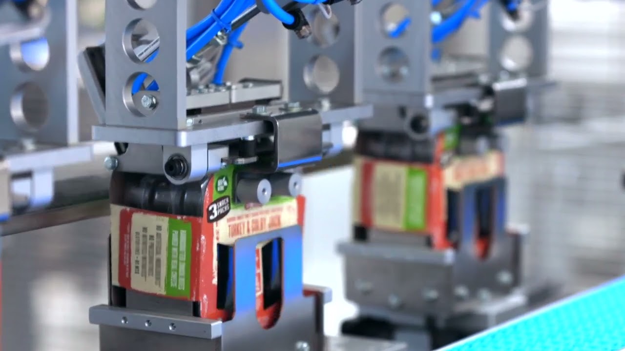 CAMA GROUP Tray Loading Snacks AR