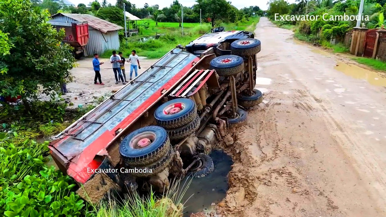 Incredible dump truck landslide Fail in canal and recovery by expert crane Spend Time 2 hours