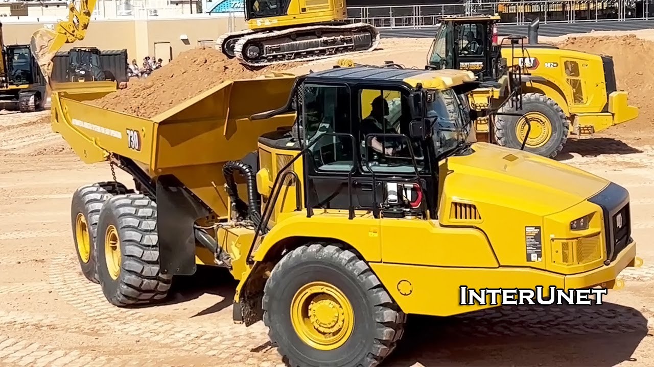 CAT 730 Articulated Haul Truck Demonstration at CONEXPO - Caterpillar Stadium Exhibits