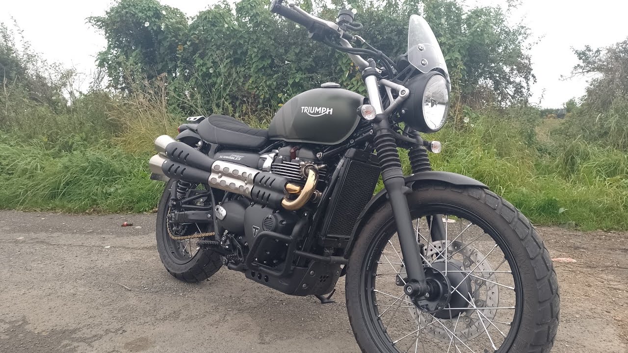 Triumph Street Scrambler 900. Bar end mirrors and a few additions.