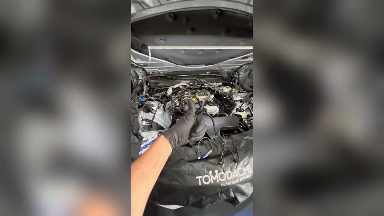 Troca bomba D’água e chicote BMW 320