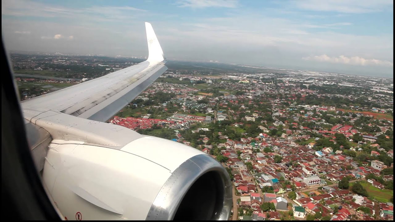 Sriwijaya Air city view landing at Sultan Hasanuddin Airport in Makasar