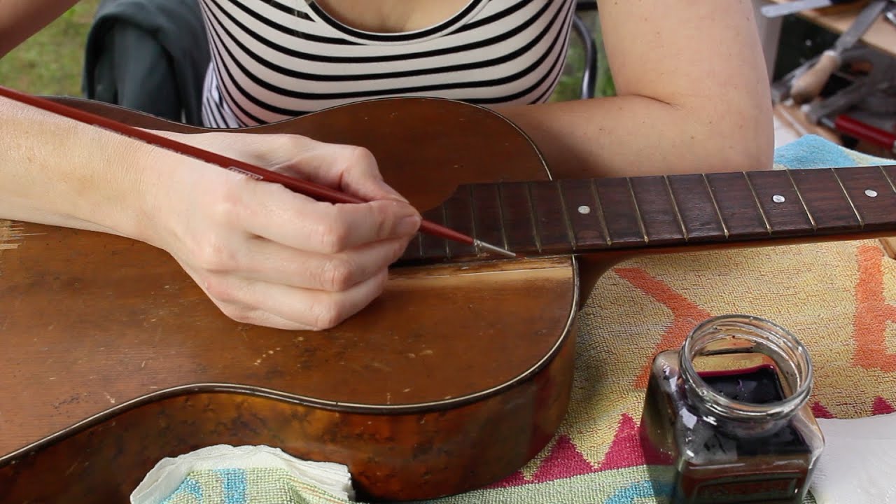 Restoring an antique parlour guitar part 9: Potassium Permanganate