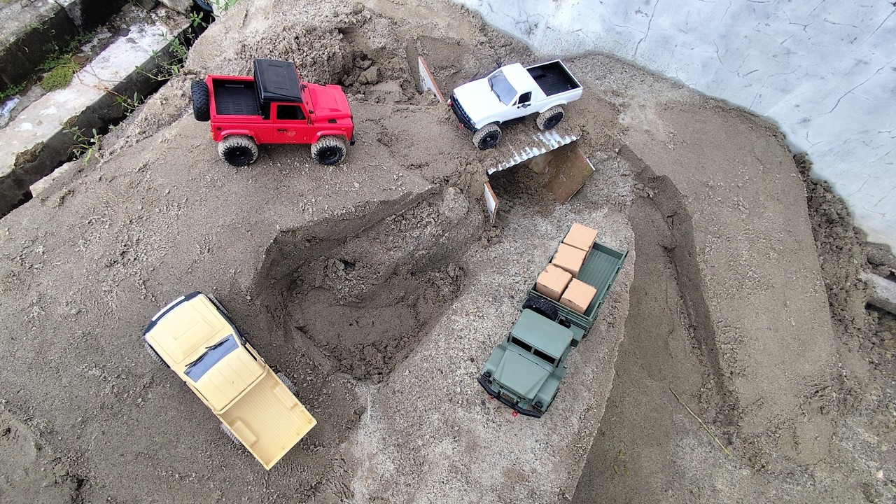 Military trucks and mini rc trucks try to conquer obstacles |Extreme RC Offroad Challenge Sand Hills